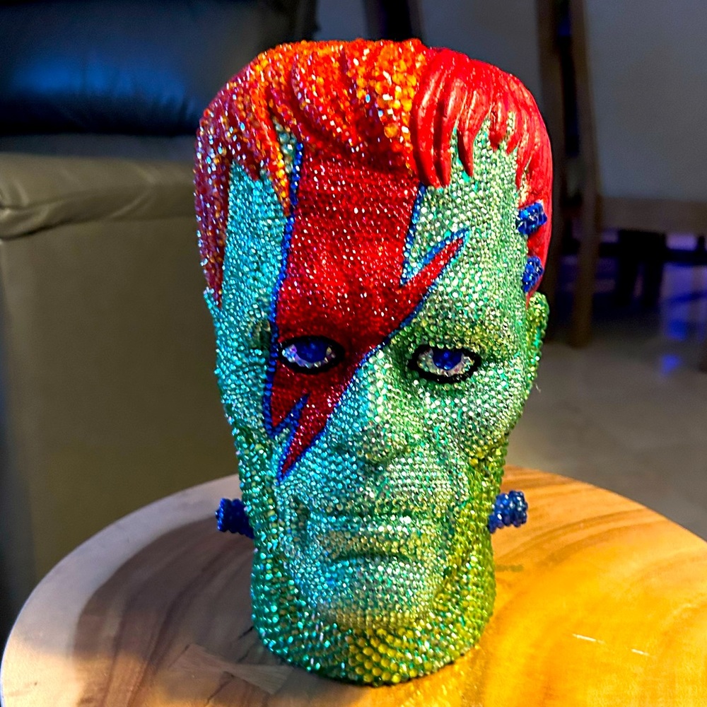 Blinged out “Ziggy Stardust” Frankenstein foam head.